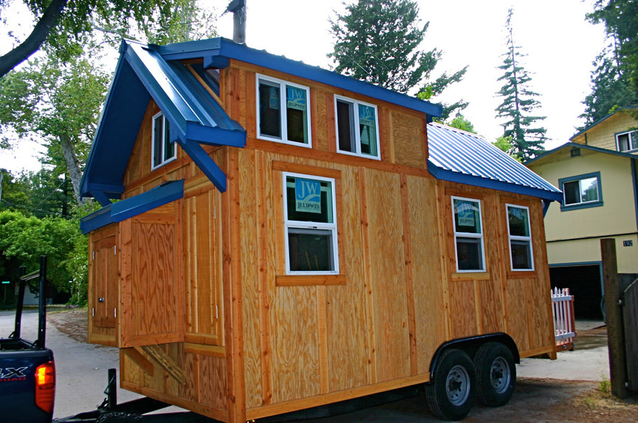 136 square feet tiny house on wheels built by Molecule Tiny Homes .